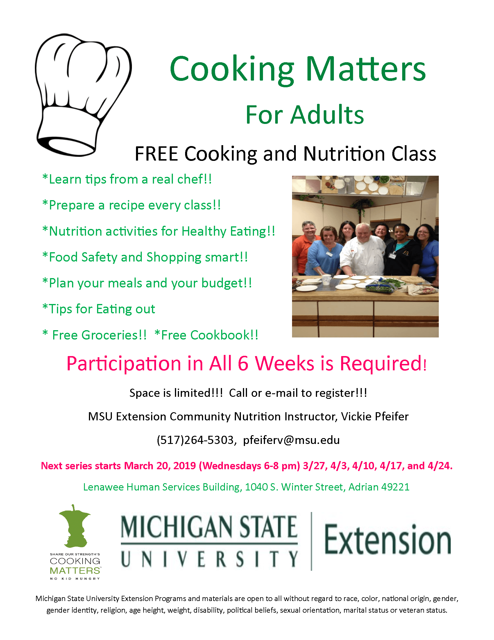 Group of people around a chef 